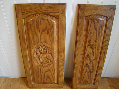 Carved Emblem on Cabinet Door